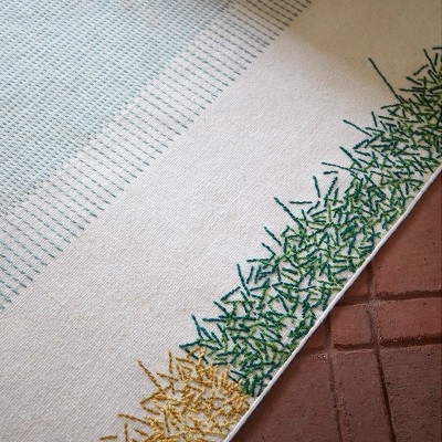 Kilim Backstitch Calm color verde de Gan Rugs en Moises Showroom Kilim Backstitch Calm color verde de Gan Rugs en Moises Showroom