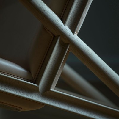 Detalle sillón Grasshopper roble de Finn Juhl en Moises Showroom Detalle sillón Grasshopper roble de Finn Juhl en Moises Showroom