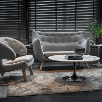 Sillón Pelican Chair con botones de House of Finn Juhl en Moises Showroom Sillón Pelican Chair con botones de House of Finn Juhl en Moises Showroom