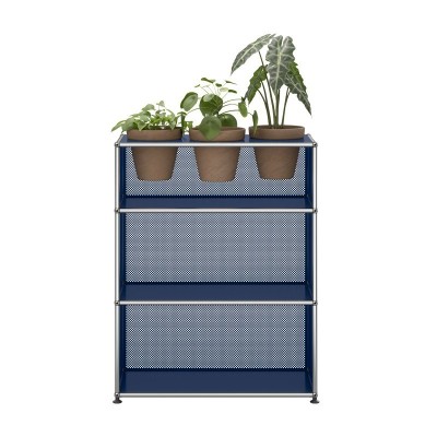 Frente estantería modular USM Haller perforada con plantas color azul acero Frente estantería modular USM Haller perforada con plantas color azul acero