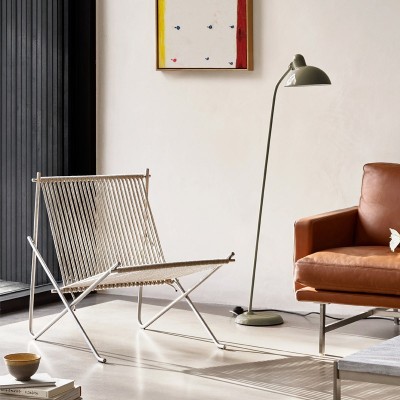 Imagen ambientada butaca PK4 driza natural y estructura en acero inoxidable de Fritz Hansen Imagen ambientada butaca PK4 driza natural y estructura en acero inoxidable de Fritz Hansen