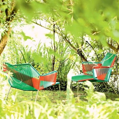 Moroso, Butaca Tropicalia con brazos y base acero inoxidable. Moroso, Butaca Tropicalia con brazos y base acero inoxidable.