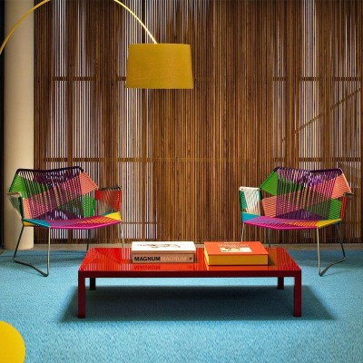 Moroso, Butaca Tropicalia con brazos y base acero inoxidable. Moroso, Butaca Tropicalia con brazos y base acero inoxidable.