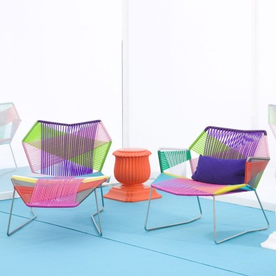 Moroso, Butaca Tropicalia con brazos y base acero inoxidable. Moroso, Butaca Tropicalia con brazos y base acero inoxidable.
