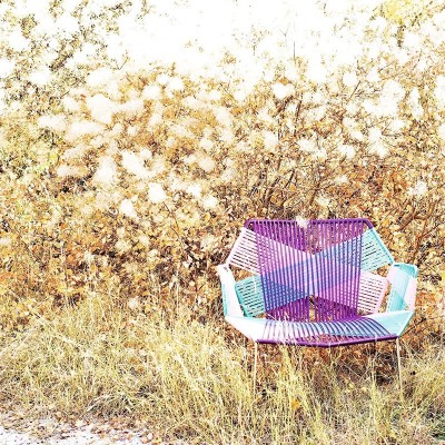 Moroso, Butaca Tropicalia con brazos y base acero inoxidable. Moroso, Butaca Tropicalia con brazos y base acero inoxidable.